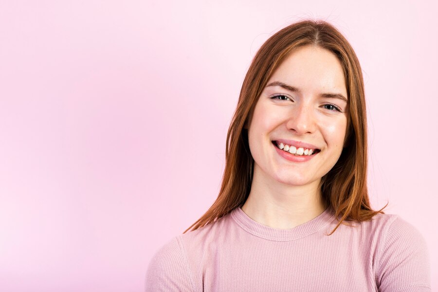 smiling female braces patient