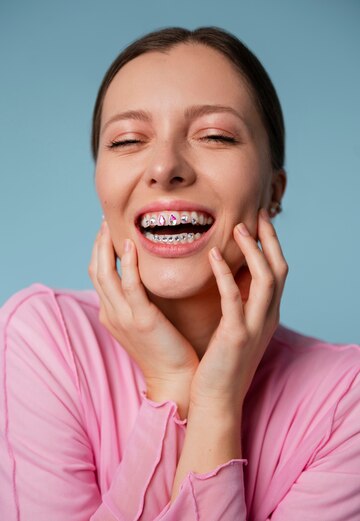 woman posing with dental braces